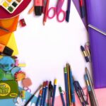 Vibrant collection of art and school supplies arranged in a flat lay. Perfect for educational themes.